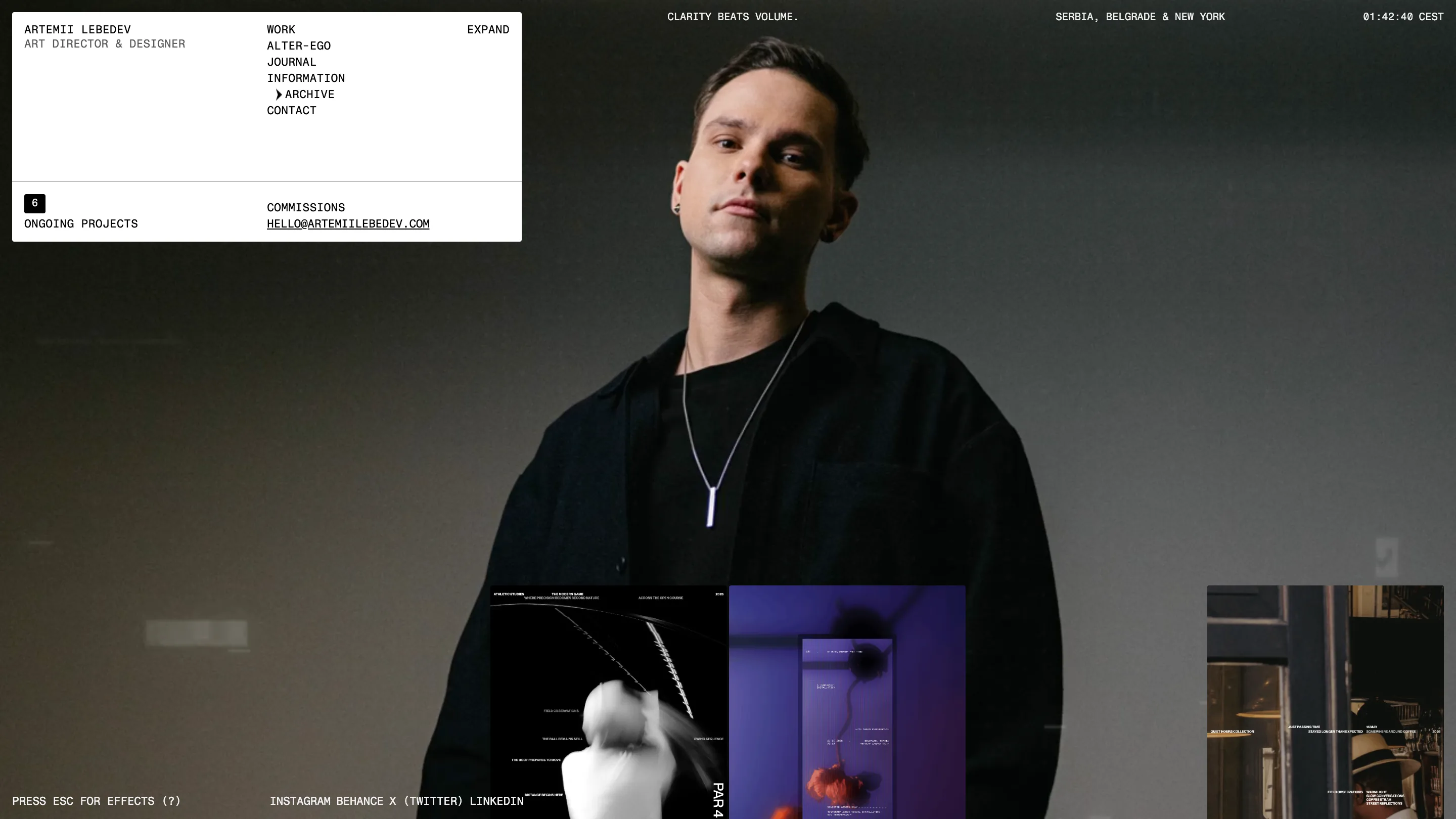 The Archive page: a full-bleed dark portrait of Artemii Lebedev in black, with poster and photo thumbnails floating along the bottom edge.